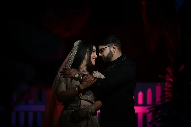 A beautiful photoshoot of the bride and groom on their wedding day, captured by Fotographiya