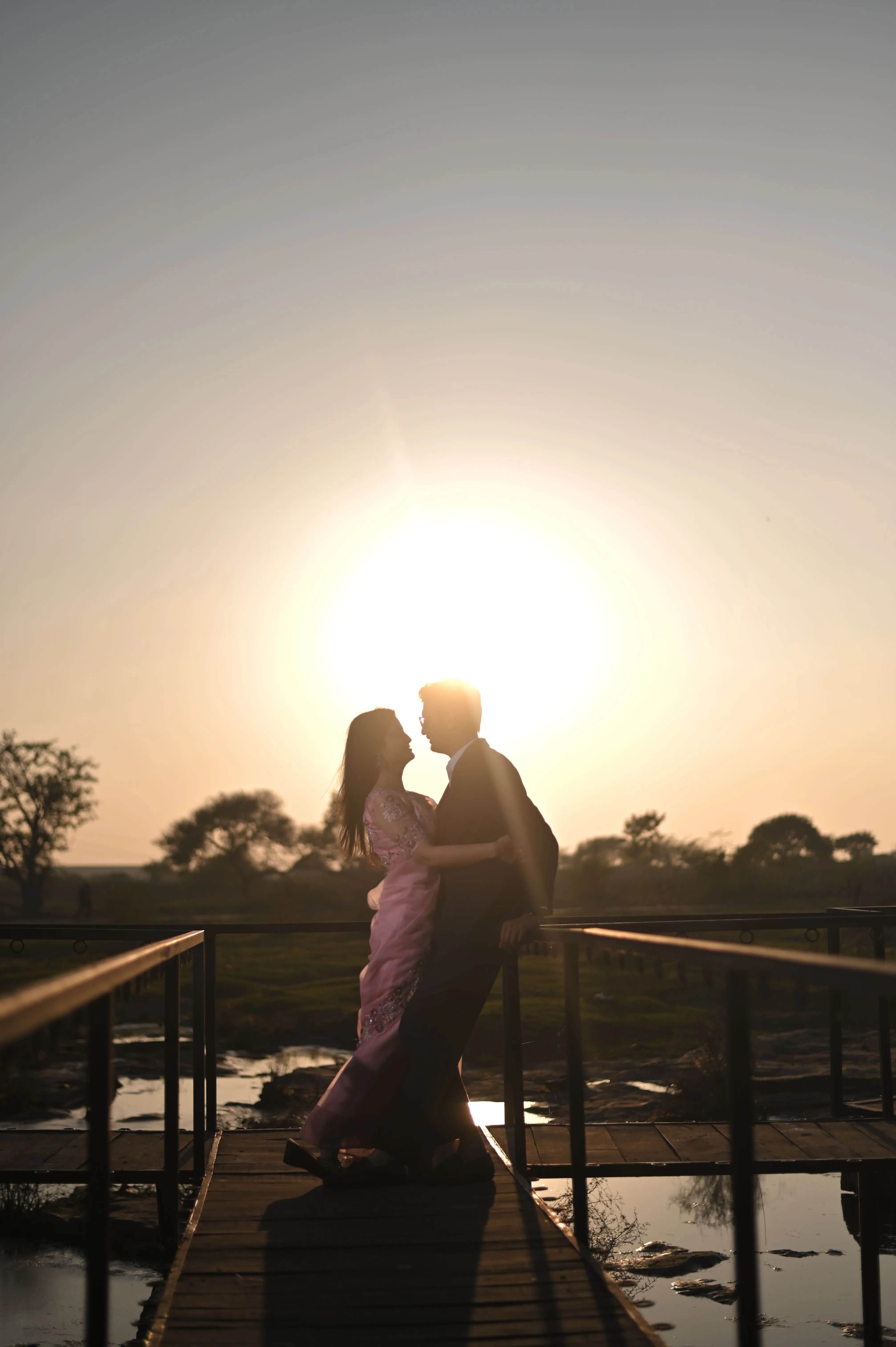 A candid, creative shot of a couple during their pre-wedding shoot, captured by Fotographiya